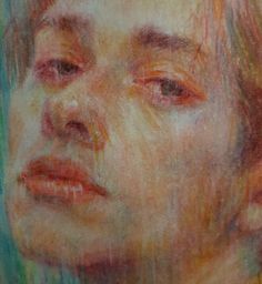 a pastel portrait of a young man's face