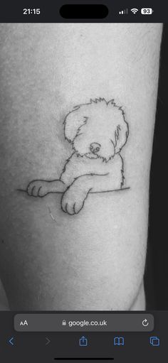 a black and white photo of a small dog on the thigh with a line drawing