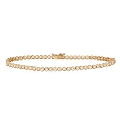 "Versatile and elegant, this 10k gold cubic zirconia tennis bracelet is a jewelry collection essential. Length: 7.25 in. Clasp: safety clasp Metal: 10k gold Packaging: boxed CUBIC ZIRCONIA DETAILS Total weight: 3 5/8 ct. Shape: round Setting: bezel Please note, a signature may be required upon delivery. Size: 7"". Color: White. Gender: female. Age Group: adult." Classic Bezel Setting Tennis Bracelet For Formal Occasions, Classic Yellow Gold Tennis Bracelet With Bezel Setting, Classic Gold Tennis Bracelet With Bezel Setting, Classic Wedding Tennis Bracelet With Bezel Setting, Classic Formal Tennis Necklace With Bezel Setting, Classic Tennis Necklace With Bezel Setting For Anniversary, Classic Cubic Zirconia Tennis Necklace With Bezel Setting, Classic Bezel Set Tennis Necklace For Anniversary, Classic Gold Bracelet With Bezel Setting For Anniversary