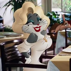 a cartoon character sitting at a table in a restaurant