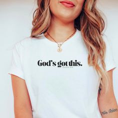 Keep the faith strong with this "God's Got This" t-shirt, inspired by Exodus 14:14: "The Lord will fight for you; you need only to be still." Featuring a simple yet powerful message, this faith-based tee embraces a minimalist design that's perfect for everyday wear. Whether you're sharing your trust in God or looking for a meaningful, casual style, this shirt is a reminder that no matter the challenge, Jesus has it covered. Ideal for those who love combining style with faith. Want this design on Let Go And Let God, God Christian, Trust In The Lord, Jesus Shirt, Christian Shirt, Let God, Jesus Shirts, Faith Based, Christian Shirts