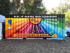 there is a sign that says you can change the world and rock elementary on it