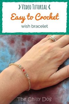 a woman's hand wearing a bracelet with the words easy to crochet on it