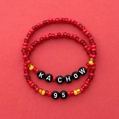 Kachow and 95 bracelets! Or Tow Mater bracelets! Please make your selection using the drop down menu. *Life Is a Highway: https://www.etsy.com/listing/1003774701/ *Tow Mater: https://www.etsy.com/listing/989823464/ *Flo's V8 Cafe: https://www.etsy.com/listing/1003786841/ Handmade with love using Czech glass beads, letter beads and stretch cord. Get creative! All my bracelets are meant to be mixed, matched & stacked!  SIZING: Measure your wrist around the widest point and add .25-.5 inches to get the most comfortable or desired fit. If you don't have a flexible tape measure, you can use a piece of string to wrap around your wrist and then measure the length of the string. (For example: my wrist size is 6" and I will wear a 6.5" bracelet for a snug fit and 7" for a loose fit). CARE INSTRUCTI Lightning Mcqueen Boyfriend Gift, Fuse Bead Bracelet, Cool Bead Patterns, Rod Wave Bracelets, Disney Inspired Clay Bead Bracelet, Lightning Mcqueen Bracelet, Movie Bracelet Ideas, Disney Friendship Bracelet Ideas, Disney Bracelet Ideas Clay Beads