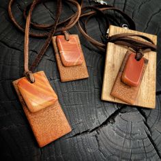 Natural Stone Pendant Necklace paired with native Texas Pecan wood. All natural, hand polished and shaped materials sourced for West Texas river stones and salvaged wood. As unique and beautiful as Texas. Each river stone and wood pairing is hung from deerskin leather and finished with a sterling silver lobster clasp. Preserve a part of Texas when you purchase our products. A wearable a bit of Texas' history to fit every occasion. Pecan Wood, Stone And Wood, River Stones, Texas History, West Texas, Stone Pendant Necklace, Deer Skin, Salvaged Wood, Stone Pendant