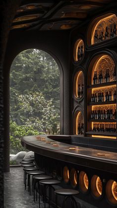 an empty bar with lots of bottles on the shelves