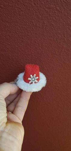 "This adorable mini Santa Hat hair clip or headband is a perfect gift for everyone who loves Christmas.  It is made of felt,  pom-pom and chenille stems.  Size: approximately 1.5\"×1.5\"" Mini Santa Hat, Red Hair Clips, Unique Hair Clip, Christmas Photo Props, White Hair Bows, Candy Sprinkles, Christmas Hair Bows, Hat Hair, Glitter Hair Bows