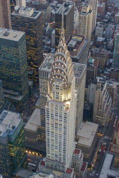 an aerial view of the chrysler building in new york city, ny at night time