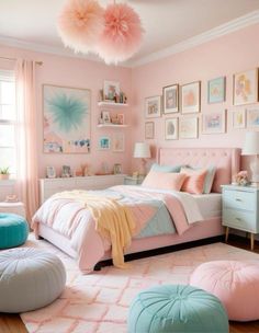 a bedroom with pink and blue decor in pastel colors, including pom poms