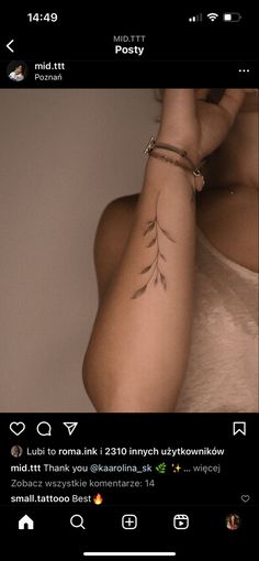 a woman with a tattoo on her arm