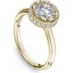 a yellow gold engagement ring with an oval diamond center