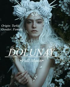 a woman in white dress with flowers on her head and the words dolnnay full moon