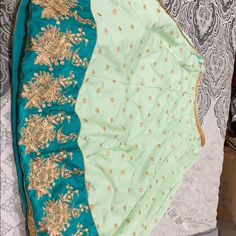 Fancy Chaniya Choli To Wear Wedding Or Garba Green Traditional Wear For Spring Wedding, Wedding Choli With Traditional Drape For Spring, Green Bollywood Lehenga For Formal Occasions, Elegant Spring Choli With Zari Work, Spring Wedding Lehenga With Traditional Drape, Fitted Traditional Wear For Spring Wedding, Spring Wedding Traditional Wear With Traditional Drape, Formal Green Lehenga With Intricate Embroidery, Spring Wedding Embroidered Choli