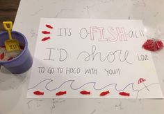 a sign that says it's fish all i'd show love to go to hoco with you