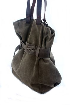 Casual Canvas Tote Bag With Canvas Lining, Casual Canvas Tote Bag With Lining, Canvas Tote Shoulder Bag With Canvas Lining, Canvas Bag With Adjustable Strap For Shopping, Casual Brown Cotton Canvas Bag, Everyday Cotton Canvas Bag, Brown Cotton Canvas Bag With Adjustable Strap, Duck Canvas Shoulder Bag For Daily Use, Cotton Tote Bag With Leather Handles