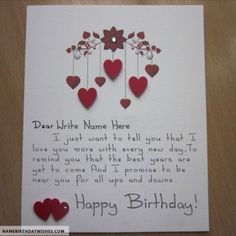 a birthday card with red hearts hanging from strings and the words dear any name here