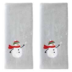 two white towels with snowmen on them