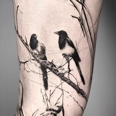 two birds sitting on a tree branch in black and white tattoo design by artist unknown