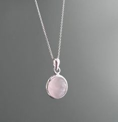 Sterling silver circle  Rose quartz necklace Matching earrings also available in my shop!! Gift box available for purchase. Search GIFTBOX Rose Quartz Necklace Silver, Pink Sterling Silver Oval Pendant Jewelry, Pink Sterling Silver Jewelry With Oval Pendant, Pink Oval Sterling Silver Necklace, Minimalist Pink Necklaces, Minimalist Pink Round Necklaces, Pink Sterling Silver Round Necklace, Minimalist Pink Sterling Silver Necklace, Pink Quartz Jewelry