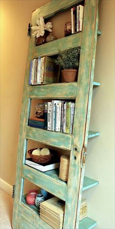 an old door has been transformed into a shelf with books on it and the words, pretty cool old door hacks