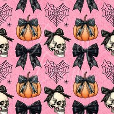 a pink background with skulls and pumpkins in black bowknots on it