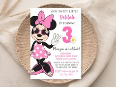 a minnie mouse birthday party with pink and black polka dots on the bottom, including a card that says our sweet little delight is turning 3