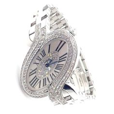 Cartier Delices de Cartier 18k White Gold Diamond Quartz Watch 3380  Works great, fully functional, absolutely mint, like new condition. Includes Cartier Watch Box. Original Retail Price: $72,000   Metal: 18k White Gold Band + Case Case  Dimensions:  Watch Length: 5.75",  Band Width: 15mm 40mm x 26mm  Weight: 125.4 grams Movement: Quartz Water Resistant:  Stones: Great Working Condition 3 ATM Diamonds VVS1 clarity, E color two rows on the bezel and on the dial  Hallmarks: Cartier Swiss Made 750 Cartier Diamond Watch Chronometer For Anniversary, Cartier Diamond Watch White Gold 17 Jewels, Cartier Designer Diamond Watch, Designer Cartier Diamond Watch, Designer Diamond Cartier Watch, Designer Cartier Diamond Watch With Diamond Hour Markers, Cartier Designer Diamond Watch With Diamond Hour Markers, Luxury Cartier Diamond Watch For Anniversary, Luxury Diamond Watch With Chronometer