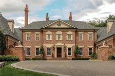 a large brick house with many windows