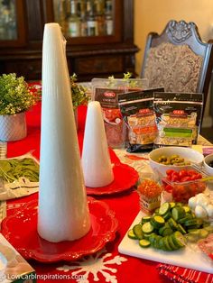 the table is set with several different types of food