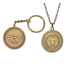 the legend of zelda keychain and pendant are shown on a white background