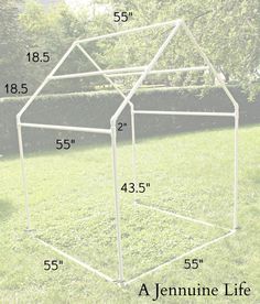 the measurements for a garden greenhouse are shown in front of a grassy area with trees and bushes