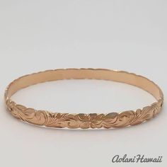 Traditional Hawaiian Hand Engraved 14k Gold Bracelet (6mm width, cutout design) - Aolani Hawaii - 3 Ceremonial 14k Gold Engraved Bangle, Traditional 14k Gold Engraved Bracelet, Traditional Engraved 14k Gold Bracelet, 14k Gold Bracelet With Engraving Option, Etched 14k Yellow Gold Bracelets, 14k Yellow Gold Etched Bracelets, 14k Gold Etched Bangle Bracelet, Ceremonial 14k Gold Engraved Bracelets, Traditional Yellow Gold Engraved Bracelets