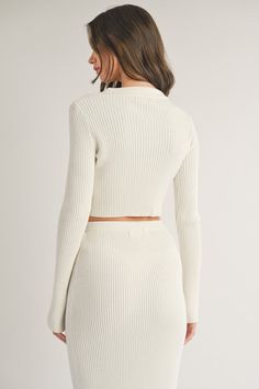 Collard Front button Ribbed Sweater - Top This ivory Collard Front Button Ribbed Sweater Top is a wardrobe essential. Crafted with 100% cotton for a comfortable fit, the ribbed sweater features a collard neckline and front buttons. Perfect for dressing up or down, this timeless sweater is a must-have for any closet. Timeless Sweater, Dressing Up, Ribbed Sweater, Wardrobe Essentials, Sweater Top, Must Haves, Comfort Fit, Dress Up, Boutique