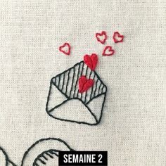 the cover of semaine 2 is shown with hearts coming out of an envelope