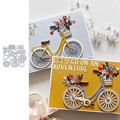 two greeting cards with bicycle and flowers on them, one has an envelope that says let's go on an adventure