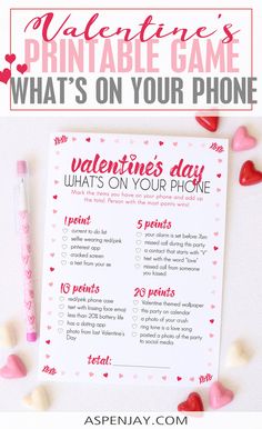 valentine's day printable game with hearts and candy on the table next to it