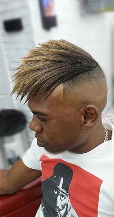 With this long top Southside fade, you can sport a unique style that will bring more attention to your tight and attractive Afro ringlets. Maintain a long top and integrate the Southside fade into the style. Check more men`s hairstyle ideas.