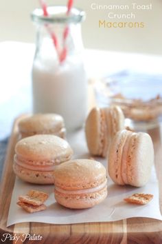 some cookies and milk are sitting on a table