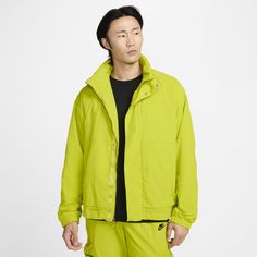 This loose-fitting jacket helps to protect you from rain and UV rays at a moments notice. The exterior is made with durable nylon, while the interior is lined with smooth taffeta and breathable mesh. Nike Tech Jacket, Tech Jacket, Nike Tech, Wet Weather, Mens Outerwear, Green Jacket, Uv Rays, Outerwear Jackets, Repellent