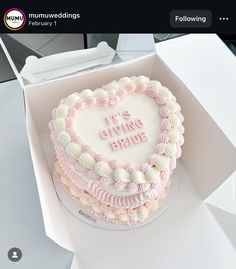 a heart shaped cake in a box with the words i'm giving bride written on it