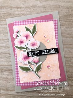 a close up of a card with flowers on it