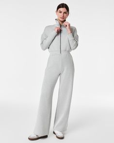 Made with spacer fabric that’s lightweight, luxuriously soft and ultra drapey, this AirEssentials Jumpsuit is your one-stop-shop for total comfort and flattery. Designed with refined comfort to feel silky against your skin, this throw-on-and-go style will take you anywhere and everywhere. | Spanx Women's AirEssentials Long Sleeve Wide Leg Jumpsuit Trendy Jumpsuit, Long Jumpsuits, Wide Leg Jumpsuit, Modern Woman, Jumpsuits For Women, Women Long Sleeve, Heather Grey, Wide Leg, Latest Trends