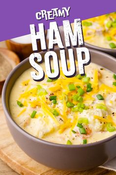 two bowls of creamy ham soup with green onions and cheddar cheese on top