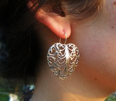 Sterling Silver Filigree Earrings, Heart Shape with a gentle Lace design. This pair of earrings is gentle as lace and outstanding as our hearts. WIll make the perfect gift for your beloved ones and thy self. Comes in a gift jewel box - ready to give away! Length: 4.2 cm (from the top of the wire) Max Width: 3.3 cm. Please let me know if you have any questions. our jewelry shop on Etsy: http://www.etsy.com/shop/Porans Thanks for visiting! Please visit my shop policies for additional information Elegant Open Heart Filigree Jewelry, Elegant Nickel-free Open Heart Earrings, Elegant Silver Teardrop Heart Earrings, Elegant Pierced Heart Earrings, Elegant Heart-shaped Nickel-free Earrings, Elegant Silver Open Heart Earrings, Heart Shaped Filigree Jewelry, Heart-shaped Filigree Jewelry, Elegant Heart-shaped Hypoallergenic Earrings