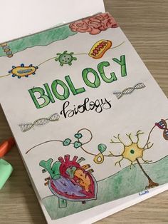 a coloring book with an image of a heart and the words biology written on it