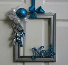 the frame is decorated with blue and silver decorations