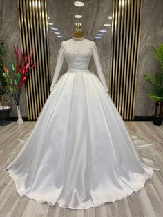 Elegant High Neck Long Sleeve Satin Ball Gown with Pearl Embellishments - Larosabride's Exclusive White Wedding Gown Christian Brides, Christian Wedding Gowns, Bridal Hijab Styles, Outfit Ideas College, White Wedding Decorations, Bride Dress Simple, Bridal Hijab, Satin Ball Gown, Trendy Prom Dresses