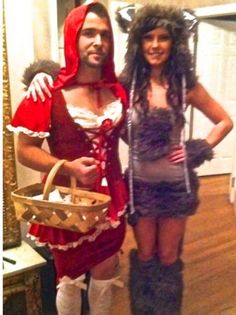 a man and woman dressed up in costumes