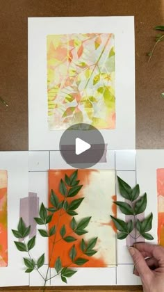 someone is making art with paper and leaves