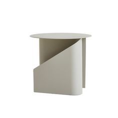 a white table with a curved corner on the top and an angled section at the bottom